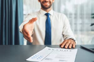 Confident Man Reach His Hand For Hand Shake During Job Interview